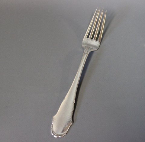 Dinner fork in Christiansborg, hallmarked silver.
5000m2 showroom.