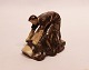 Stoneware figure in dark colors by Saxbo.
5000m2 showroom.
