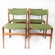 Sæt af fire spisestuestole I teak og grøn polstring designet af Erik Buck fra 
1960erne. Fremstillet hos O.D møbler. Fremstillet hos O.D møbler
