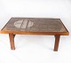 Coffee table in teak with tiles of Danish design from the 1960s.
5000m2 showroom.